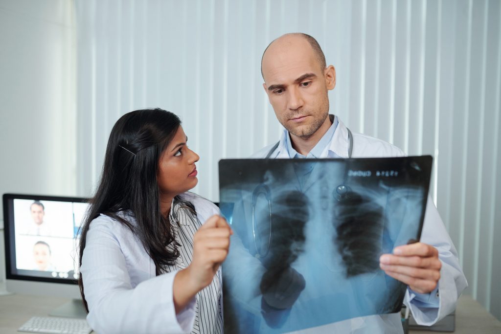 Doctors discussing chest x-ray