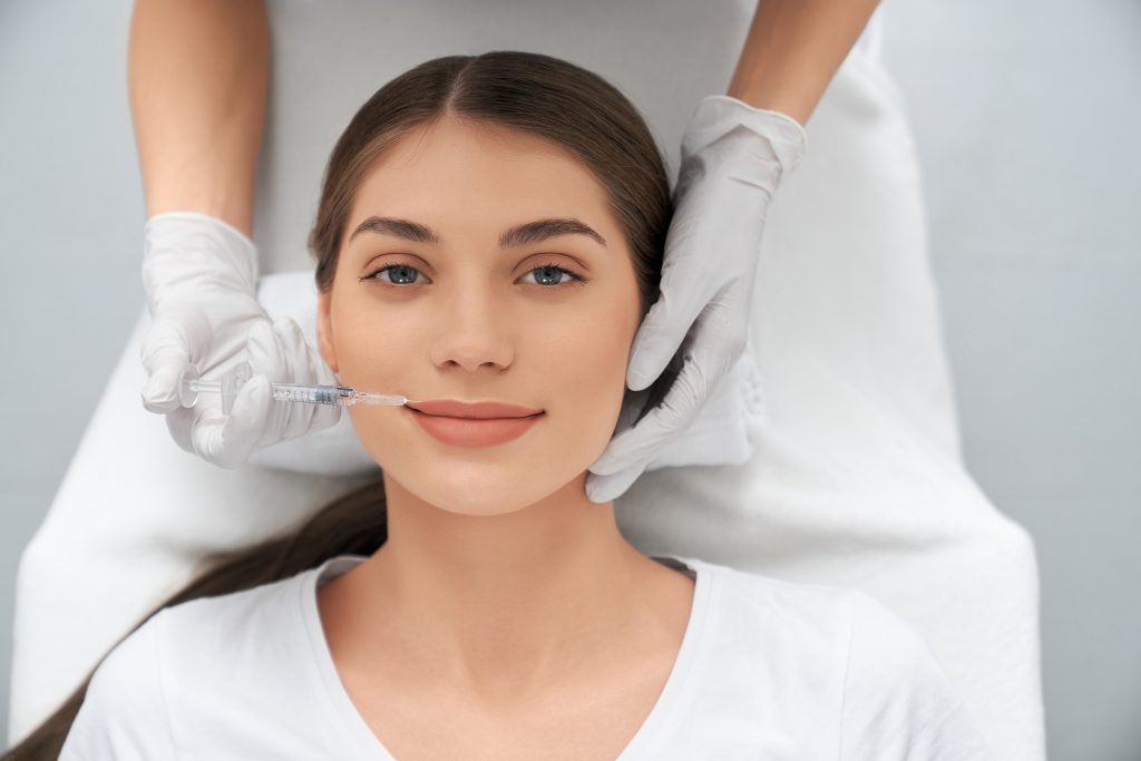 Process procedure lip augmentation in professional salon.